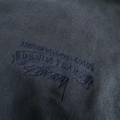 Stussy Denim Tears SS25 聯名藏青工裝夾克掛拍